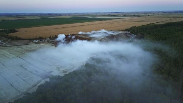 Aerial view of smoking landfill site in Sremska Mitrovica Serbia.