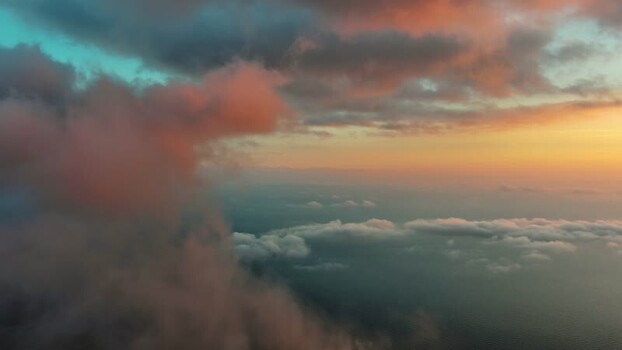 Aerial view of golden sunset clouds over the sea Montenegro. Aerial view of golden sunset clouds over the sea Montenegro.