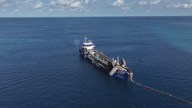 Aerial view of a dredger ship in the ocean near Gulhi Maldives.