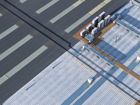 Melbourne VIC Australia 22 September 2026 Aerial view of industrial factory rooftops in Kilsyth featuring corrugated metal surfaces and multiple HVAC units. Melbourne VIC Australia 22 September 2026 Aerial view of industrial factory rooftops in Kilsyth featuring corrugated metal surfaces and multiple HVAC units.
