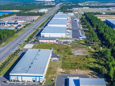 Wilmington United States 27 September 2026 Aerial view of industrial warehouses and logistics facilities surrounded by forest and roads in Wilmington North Carolina. Wilmington United States 27 September 2026 Aerial view of industrial warehouses and logistics facilities surrounded by forest and roads in Wilmington North Carolina.