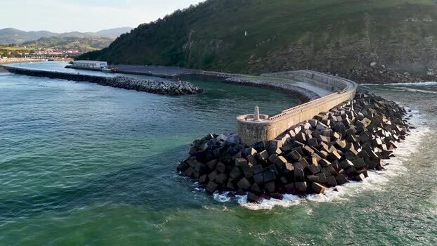 Aerial view of Antilla beach breakwater in Spain.