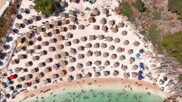 Aerial view of crowded beach in Thasos Greece. Aerial view of crowded beach in Thasos Greece.