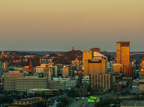 Aerial view of the Carew Tower and other skyscrapers basking in the warm glow of the setting sun Cincinnati Ohio United States. Aerial view of the Carew Tower and other skyscrapers basking in the warm glow of the setting sun Cincinnati Ohio United States.