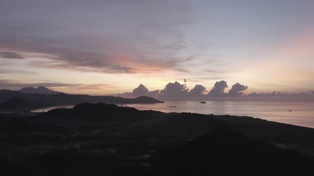 Aerial view of Mount Agung and the coastline at sunrise Indonesia. Aerial view of Mount Agung and the coastline at sunrise Indonesia.