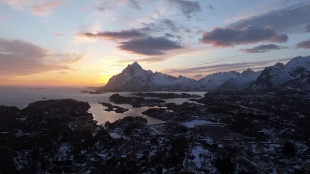 Aerial view of Lofoten mountains at sunset in Norway.