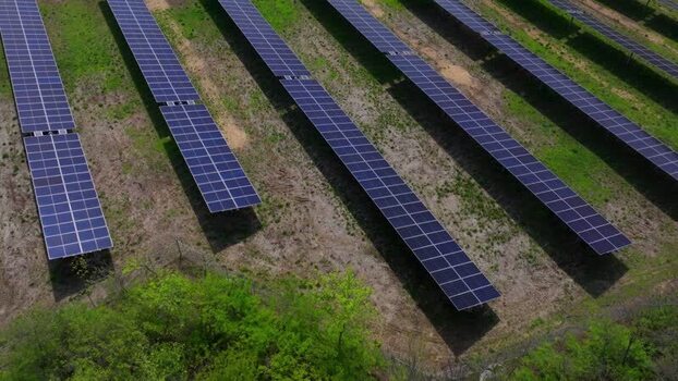 Aerial view of solar panels in a field in Lebanon Ohio United States. Aerial view of solar panels in a field in Lebanon Ohio United States.