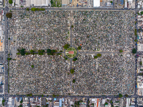 Aerial view of Maximo Gomez National Cemetery with its dense grid of graves and central circular plaza Santo Domingo Distrito Nacional Dominican Republic. Aerial view of Maximo Gomez National Cemetery with its dense grid of graves and central circular plaza Santo Domingo Distrito Nacional Dominican Republic.