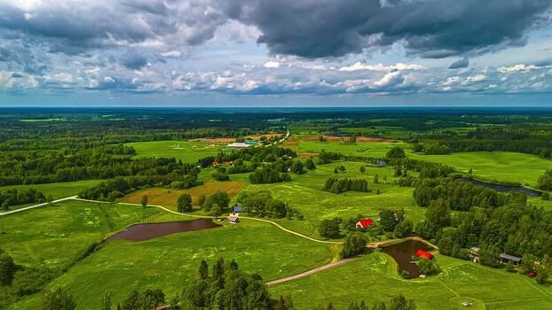 Aerial view of rural landscape with ponds and houses Latvia. Aerial view of rural landscape with ponds and houses Latvia.