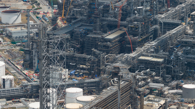Aerial view of the Eastern Economic Corridor of Innovation EECi industrial complex with intricate piping storage tanks and scaffolding in Tambon Pa Yup Nai Chang Wat Rayong Thailand. Aerial view of the Eastern Economic Corridor of Innovation EECi industrial complex with intricate piping storage tanks and scaffolding in Tambon Pa Yup Nai Chang Wat Rayong Thailand.