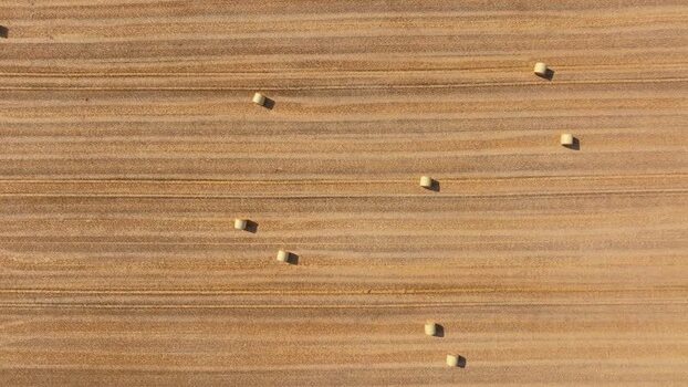 Aerial view of hay bales in a field in Germany.