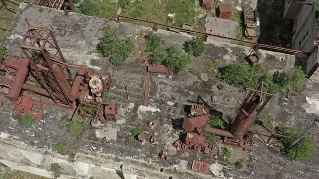 Aerial view of abandoned factory in Caucasus Mountains Russia.