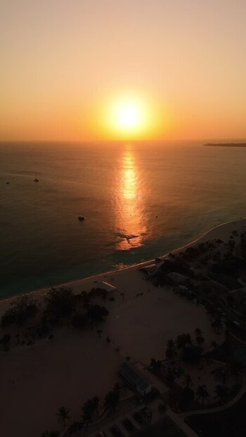 Aerial view of Grand Cayman beach at sunset Cayman Islands. Aerial view of Grand Cayman beach at sunset Cayman Islands.