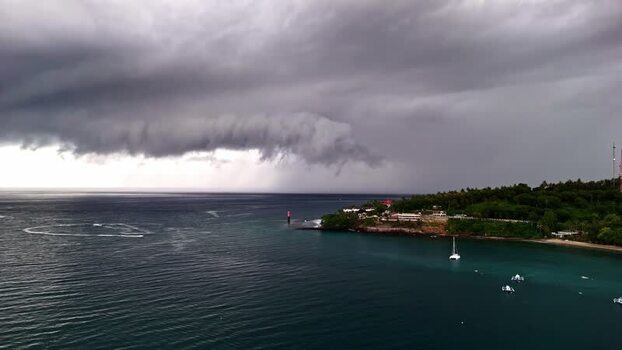 Aerial view of stormy clouds over the coast of Bali Indonesia.
