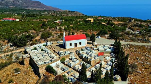 Aerial view of a cemetery and church in Crete Greece.