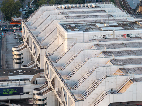 Aerial view of the Internationales Congress Centrum Berlin a landmark of brutalist architecture featuring white stepped facades and exterior staircases Berlin Berlin Germany. Aerial view of the Internationales Congress Centrum Berlin a landmark of brutalist architecture featuring white stepped facades and exterior staircases Berlin Berlin Germany.