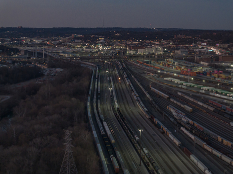 Cincinnati United States 27 February 2026 Aerial view of rail tracks cutting through the landscape illuminated by the soft glow of twilight. Cincinnati United States 27 February 2026 Aerial view of rail tracks cutting through the landscape illuminated by the soft glow of twilight.