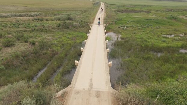 Aerial view of cyclist on bridge in Greyton South Africa. Aerial view of cyclist on bridge in Greyton South Africa.