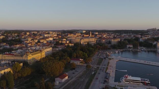 Aerial view of Pula Arena and the historic harbor in Croatia. Aerial view of Pula Arena and the historic harbor in Croatia.