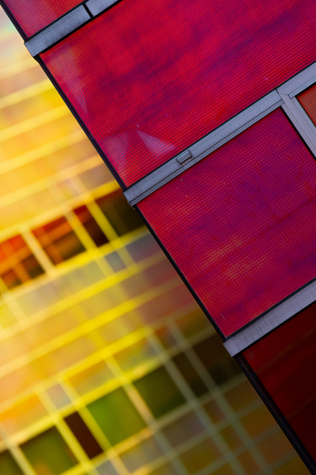 View of geometric patterns with contrasting intense red and yellow hues create an abstract composition La Defense Flevoland Netherlands. View of geometric patterns with contrasting intense red and yellow hues create an abstract composition La Defense Flevoland Netherlands.