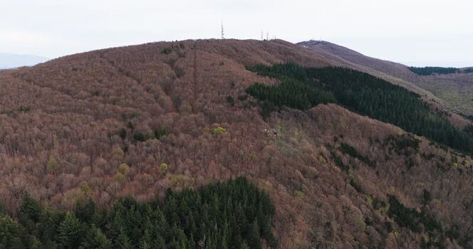 Aerial view of the forested hills and antennas in Vallombrosa Italy. Aerial view of the forested hills and antennas in Vallombrosa Italy.