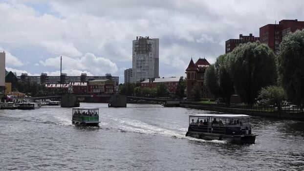 View of tour boats on the Pregolya River in Kaliningrad Russia.