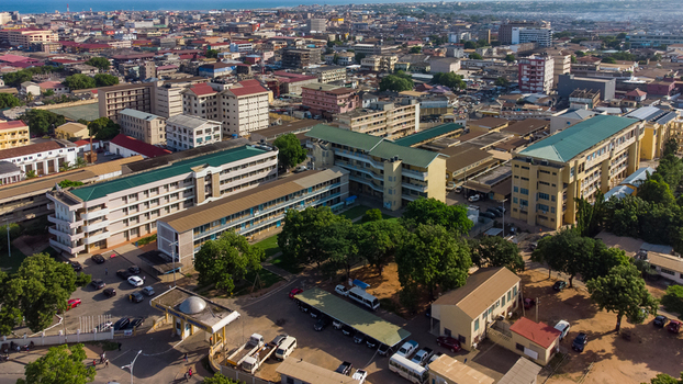 Aerial view of Accra Technical University campus featuring academic buildings parking areas and surrounding urban landscape in Accra Greater Accra Region Ghana. Aerial view of Accra Technical University campus featuring academic buildings parking areas and surrounding urban landscape in Accra Greater Accra Region Ghana.