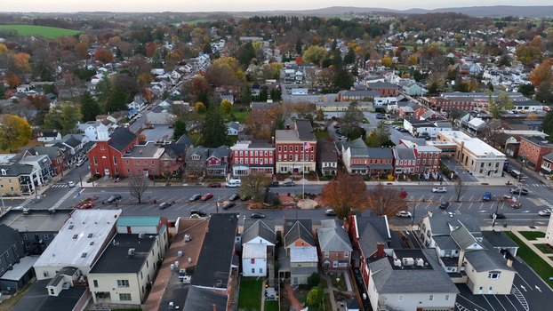 Aerial view of Manheim Square surrounded by historic buildings and vibrant autumn foliage in the town of Manheim Pennsylvania United States. Aerial view of Manheim Square surrounded by historic buildings and vibrant autumn foliage in the town of Manheim Pennsylvania United States.