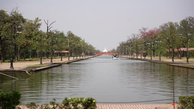 View of the World Peace Pagoda and central canal in Lumbini Nepal.