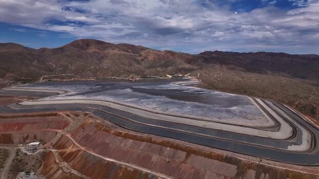 Aerial view of tailing ponds and mountains United States. Aerial view of tailing ponds and mountains United States.