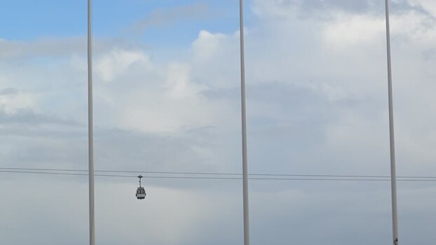 View of cable cars and tall poles Portugal. View of cable cars and tall poles Portugal.