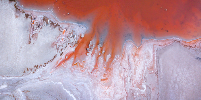 Aerial view of the contrasting red and white hues blend in the Great Salt Lake s unique landscape Salt Lake City Utah United States. Aerial view of the contrasting red and white hues blend in the Great Salt Lake s unique landscape Salt Lake City Utah United States.