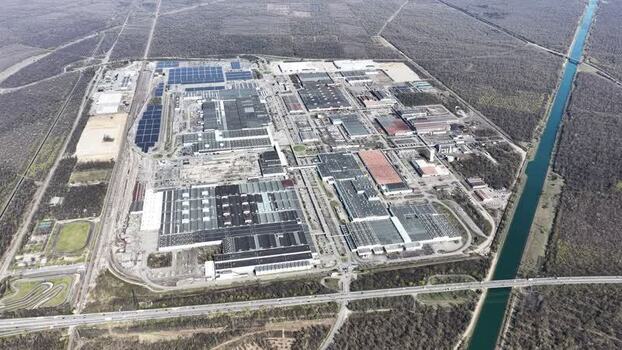 Aerial view of factory and solar panels France.