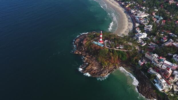 Aerial view of Vizhinjam Lighthouse and the coast in India. Aerial view of Vizhinjam Lighthouse and the coast in India.