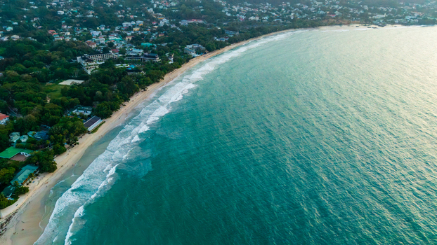 Aerial view of Beau Vallon Beach with turquoise waters white sand and lush coastal vegetation Beau Vallon Seychelles.