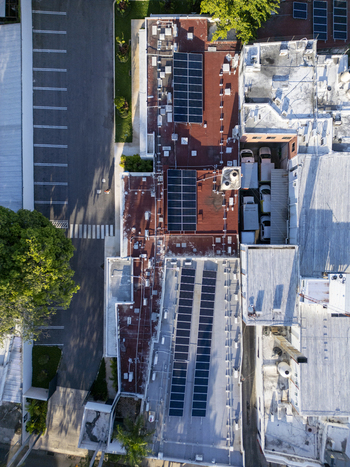 Aerial view of residential rooftops equipped with solar panels in the urban landscape of Merida Yucatan Mexico. Aerial view of residential rooftops equipped with solar panels in the urban landscape of Merida Yucatan Mexico.