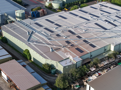 Melbourne VIC Australia 22 September 2026 Aerial view of industrial factory buildings in Kilsyth featuring rooftop solar panels ventilation pipes and a smoking chimney. Melbourne VIC Australia 22 September 2026 Aerial view of industrial factory buildings in Kilsyth featuring rooftop solar panels ventilation pipes and a smoking chimney.