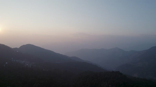 Aerial view of misty mountain ranges of Chopta Tungnath India.