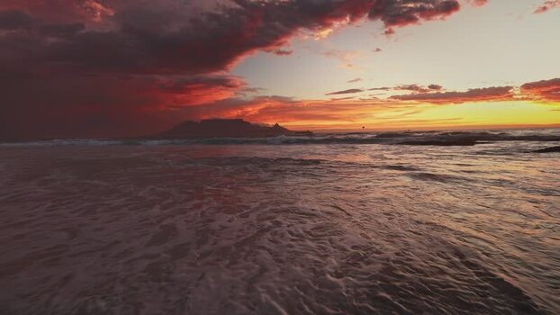 View of Table Mountain and the ocean at sunset South Africa.