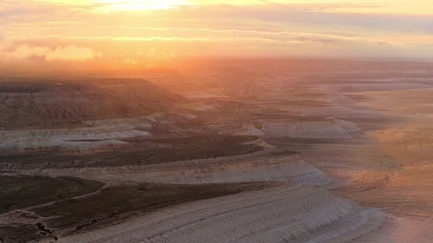 Aerial view of the Tuzbair salt flat and white limestone cliffs Kazakhstan.
