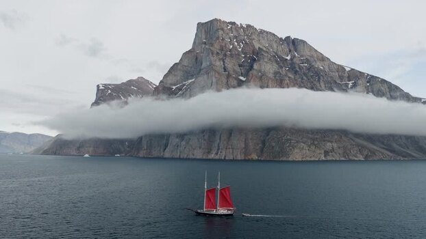 Aerial view of Storoen and sailboat in Greenland. Aerial view of Storoen and sailboat in Greenland.