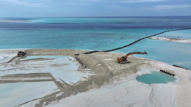 Aerial view of land reclamation on a tropical island Maldives.