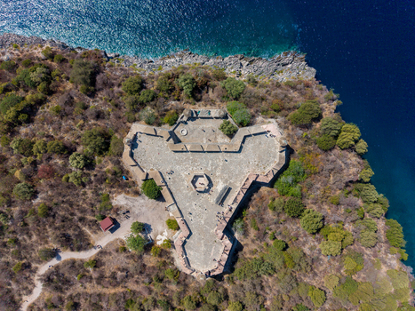 Aerial view of The Castle of Porto Palermo a historic triangular fortress on a rocky peninsula surrounded by the Ionian Sea Porto Palermo Qarku i Vlores Albania.