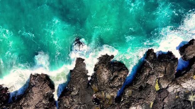 Aerial view of Kalaemamo volcanic cliffs and ocean United States.