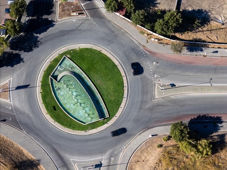 Aerial view of a roundabout with a central fountain and green landscaping in Elvas Portalegre Portugal. Aerial view of a roundabout with a central fountain and green landscaping in Elvas Portalegre Portugal.
