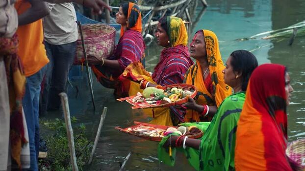 View of women performing religious rituals in water Bangladesh. View of women performing religious rituals in water Bangladesh.