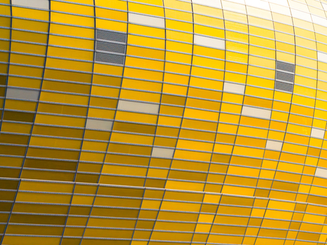 Aerial view of the Polsat Plus Arena a shimmering mosaic of gold amber and cream panels creating a warm inviting glow Gdansk Pomeranian Voivodeship Poland. Aerial view of the Polsat Plus Arena a shimmering mosaic of gold amber and cream panels creating a warm inviting glow Gdansk Pomeranian Voivodeship Poland.