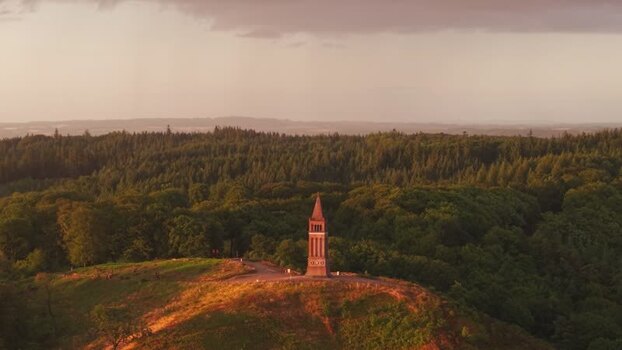 Aerial view of Himmelbjerget tower at sunset Denmark.