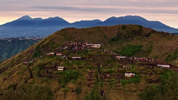 Aerial view of volcanic hillside settlement in Bali Indonesia.