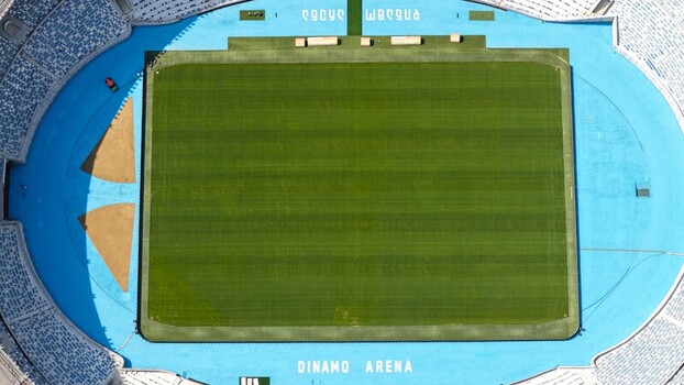Tbilisi Tbilisi Georgia 22 September 2026 Aerial view of Boris Paichadze Dinamo Arena with its vibrant blue running track surrounding the green football pitch.